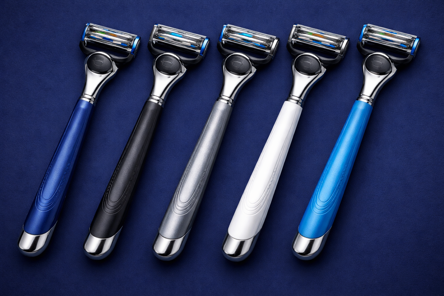 Five razors with different colored handles on a dark blue background